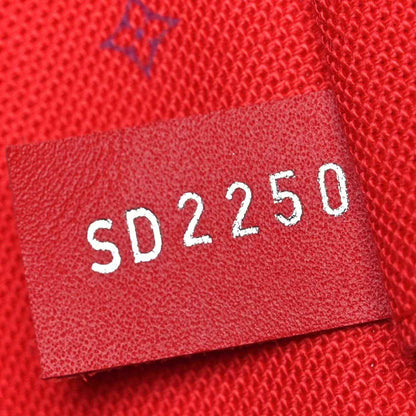 Red fabric size label showing "502250" on tote bag