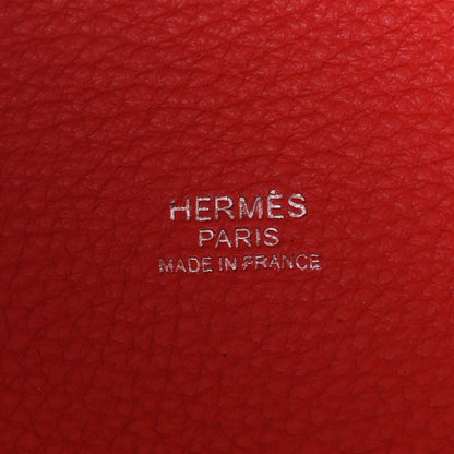 Red leather with embossed 'HERMES PARIS' text and 'MADE IN FRANCE'
