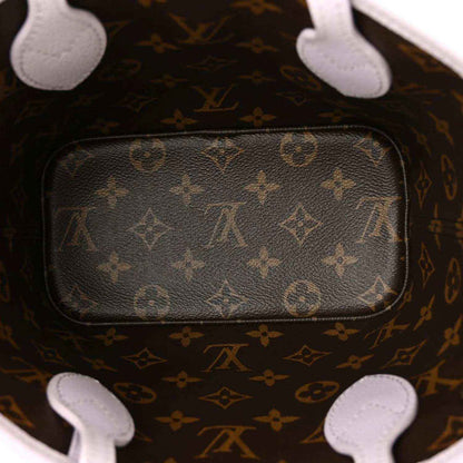 Interior lining of a Louis Vuitton BB bag with brown monogram pattern