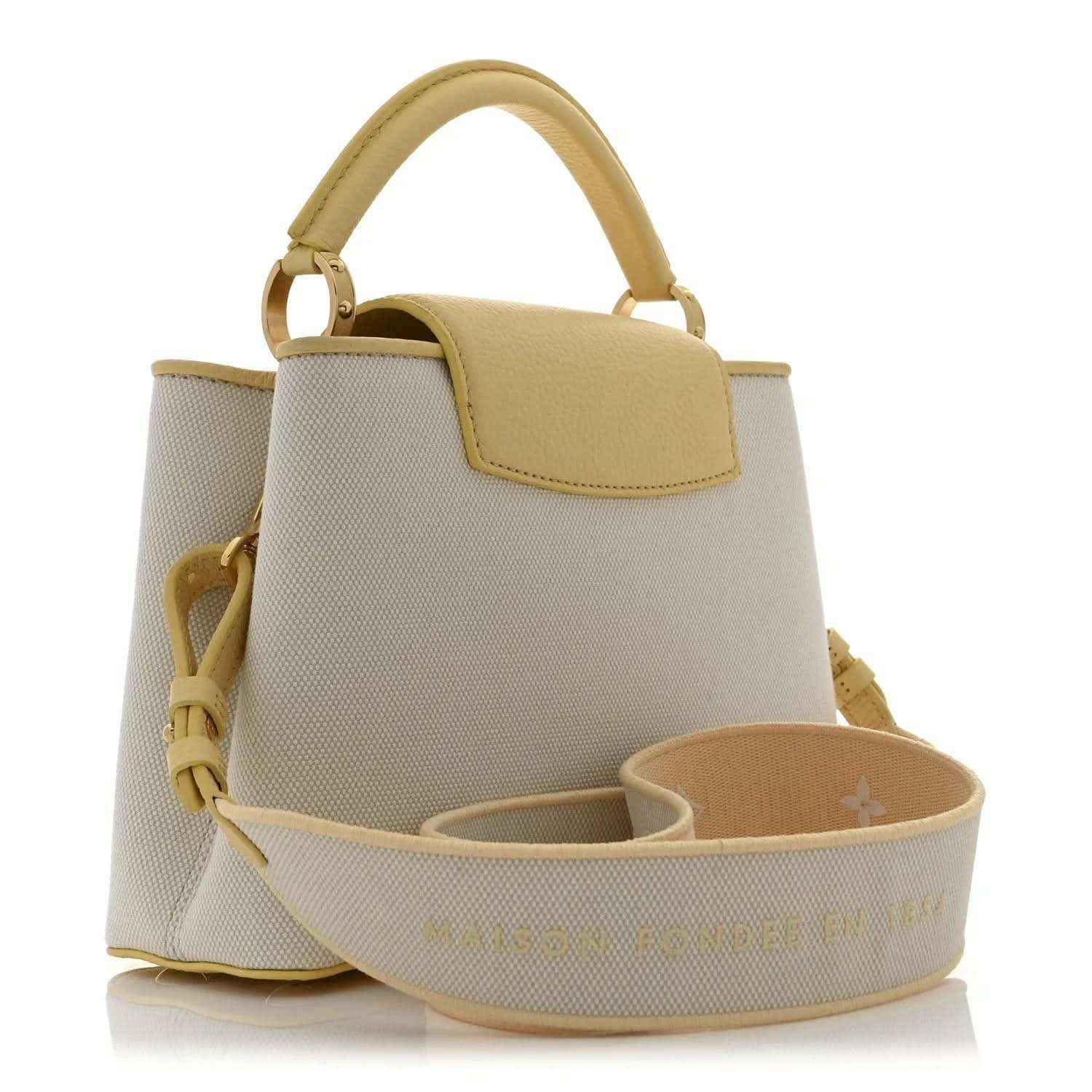 Louis Vuitton Capucines BB handbag with top handle and open interior pocket