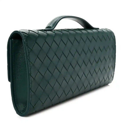 Emerald green intrecciato nappa long clutch bag side view with woven pattern