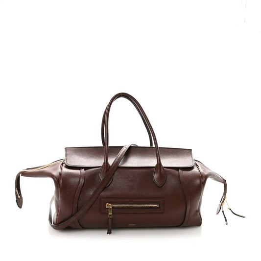 Shiny lambskin medium handbag in dark brown with top handles and front zip pocket