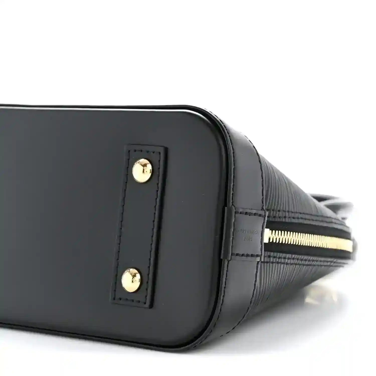 Black leather handbag with gold-tone hardware and top handle base