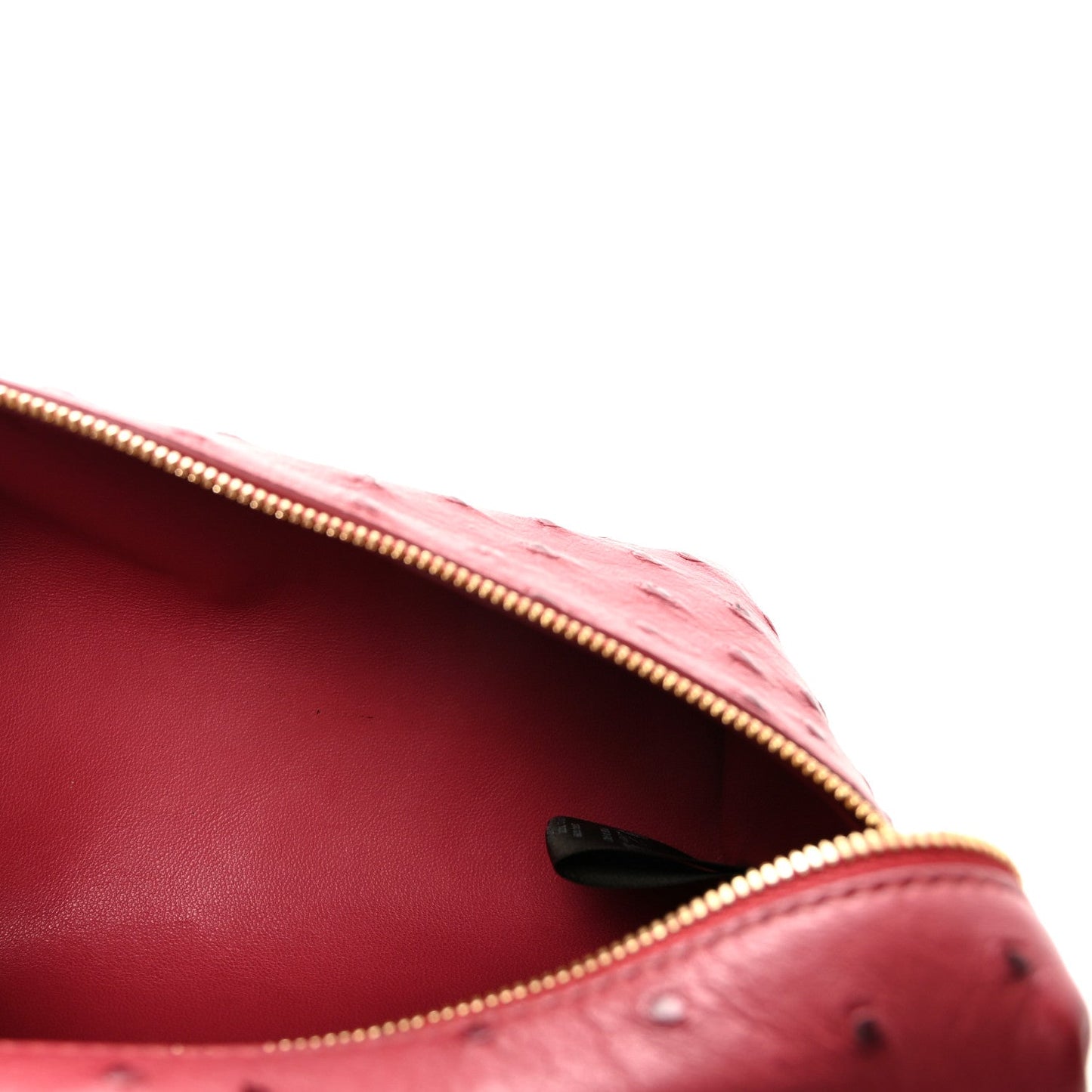 Loro Piana ostrich pouch fuchsia, open top with gold zipper and red interior