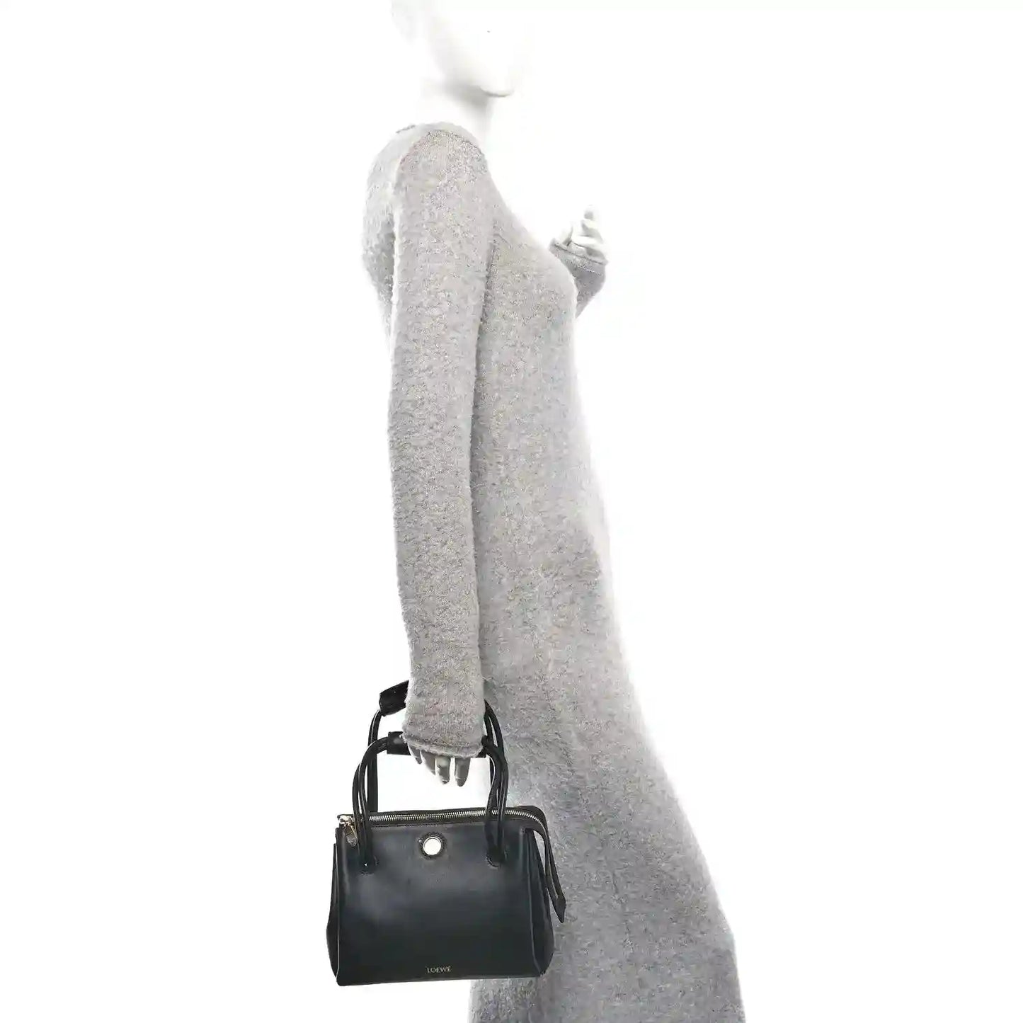 Small black leather handbag with top handles and shoulder strap
