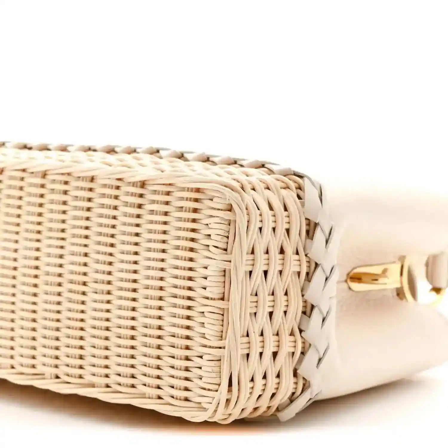 Louis Vuitton rattan handbag side with woven lattice and gold clasp