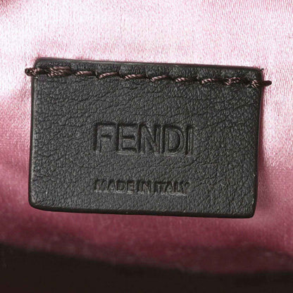 Mini baguette handbag front label with embossed FENDI text and MADE IN ITALY