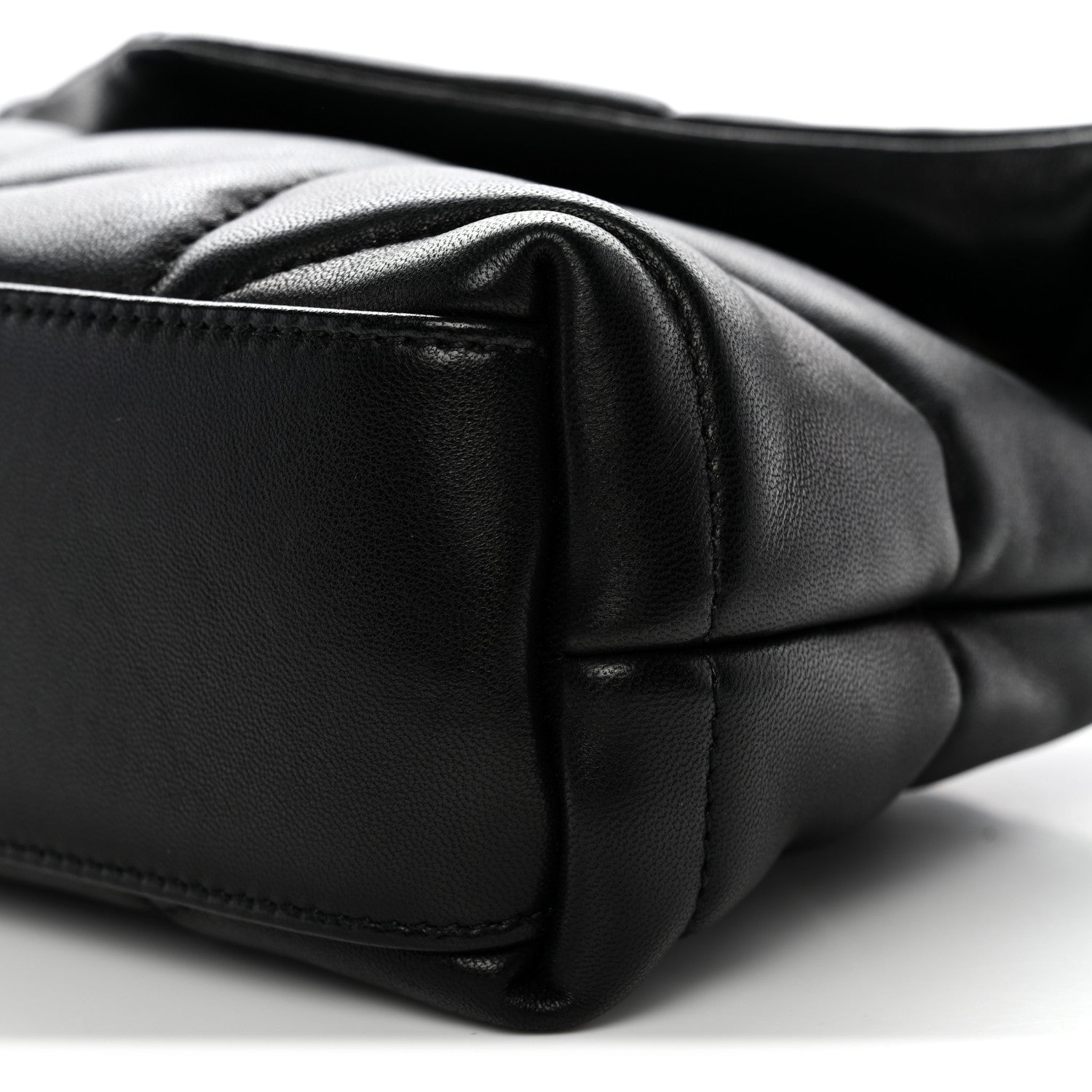 Saint Laurent quilted lambskin satchel edge close-up with black leather panel