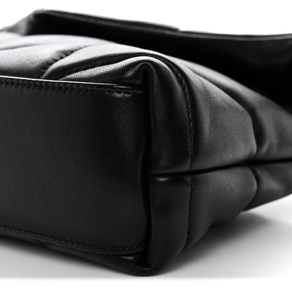 Saint Laurent quilted lambskin satchel edge close-up with black leather panel