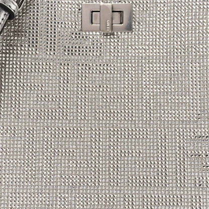 Silver crystal leather front panel with central logo clasp