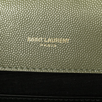 Saint Laurent Paris embossed on light sage leather panel