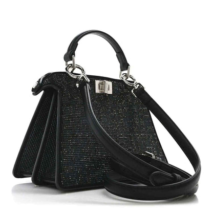 Black crystal satchel with silver-tone clasp and leather shoulder strap