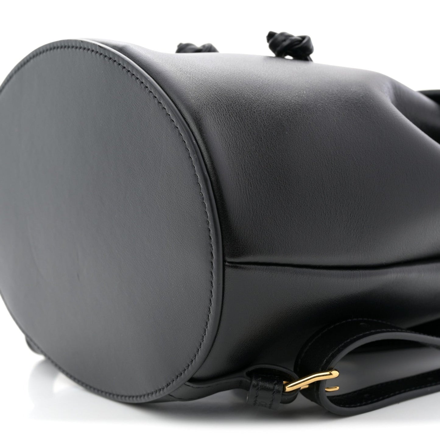 Black leather Bonnie backpack with gold zipper pull and rounded side