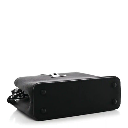 Black mini handbag bottom with metal studs and side hardware