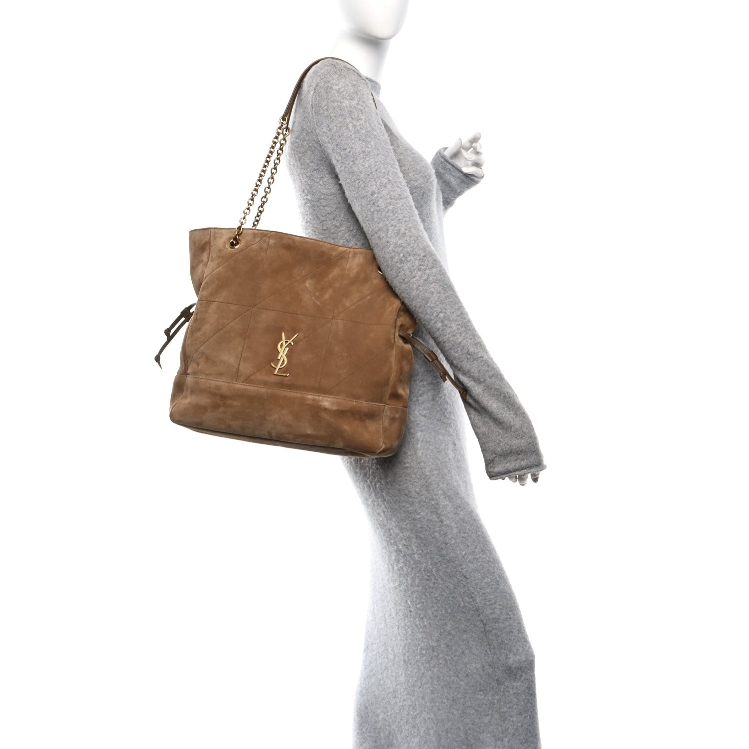 Suede medium shopping tote with chain strap and YSL logo, carried by model