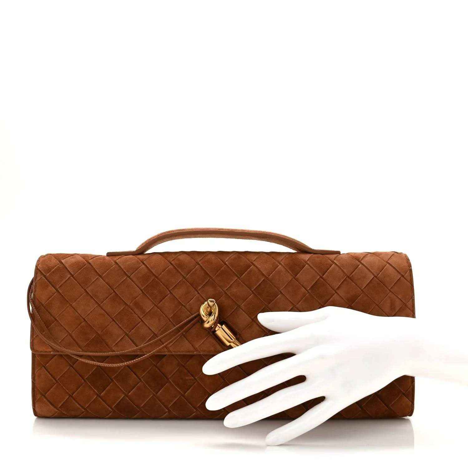 Amber suede intrecciato clutch with top handle and gold clasp, side view