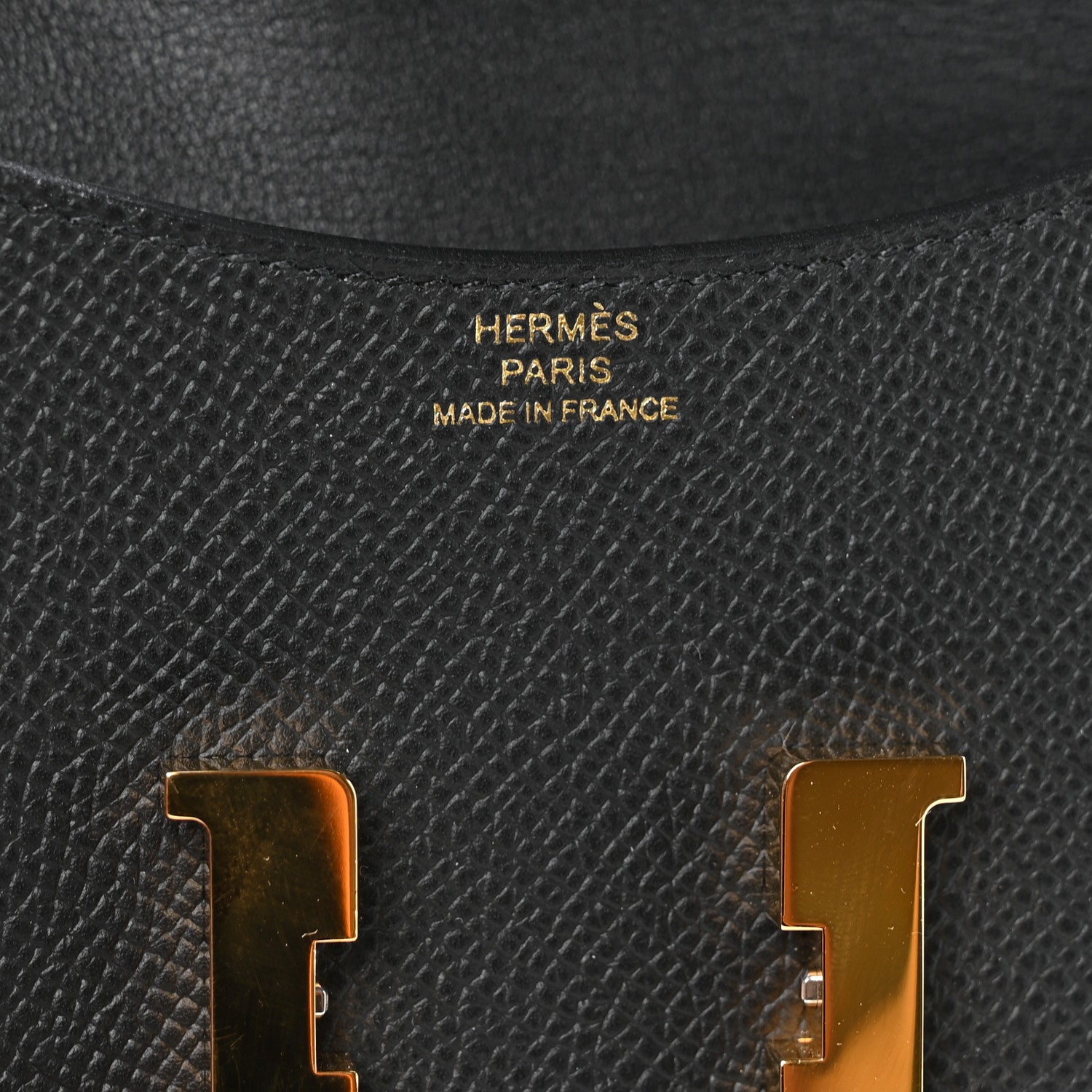 Hermès Constance Slim Wallet in black Epsom leather with gold-tone logo