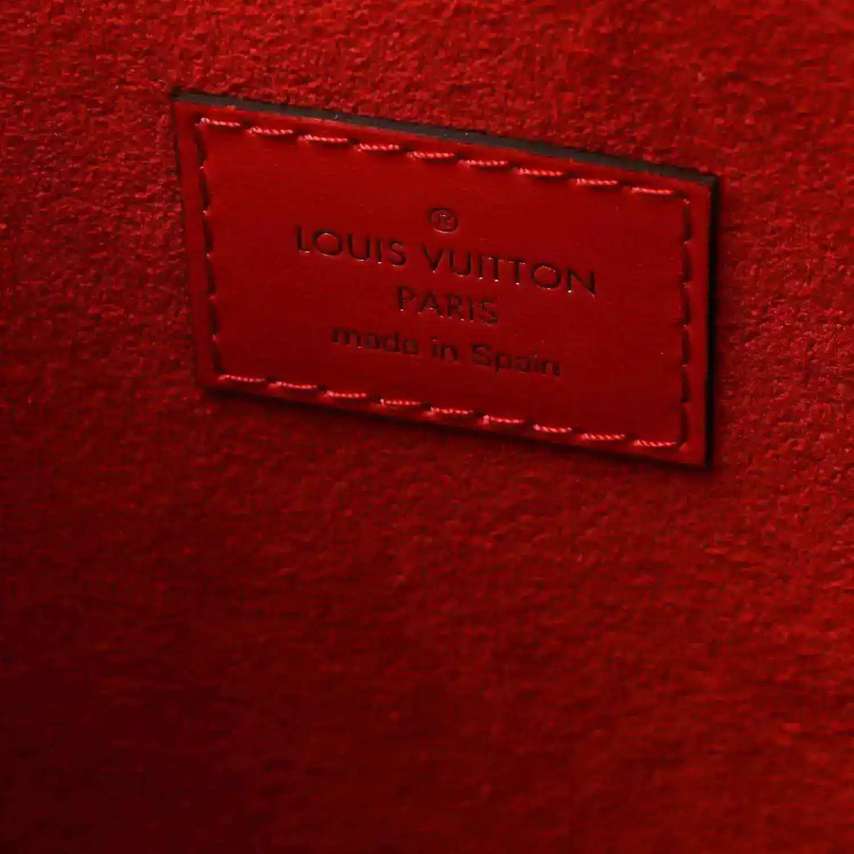 Louis Vuitton Paris made in Spain red leather label on tote bag
