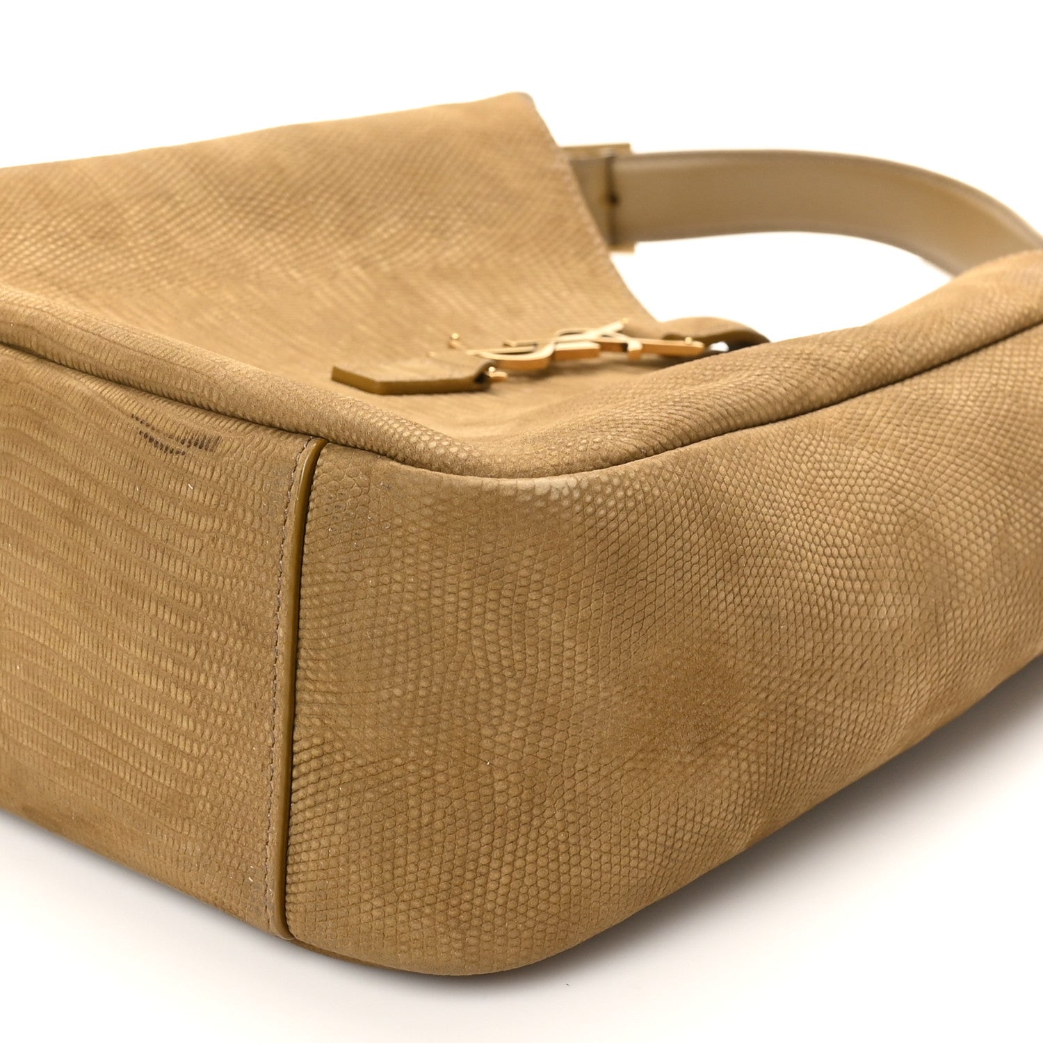 Small hobo bag side view with top magnetic closure and lizard-embossed texture