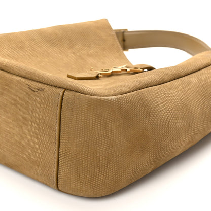 Small hobo bag side view with top magnetic closure and lizard-embossed texture