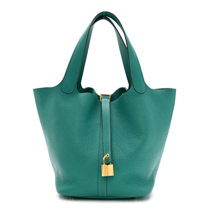 Green leather Picotin-style tote with top handles and gold lock charm