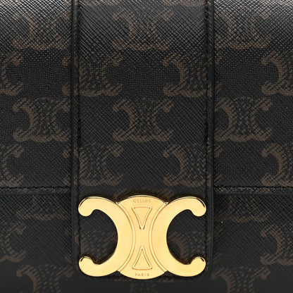 Celine Triomphe shoulder bag front close-up with gold CD clasp on dark brown canvas