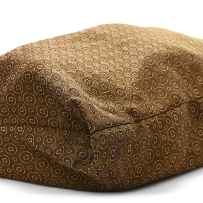 Hobo bag with rounded silhouette and jacquard medallion pattern, brown/olive fabric.