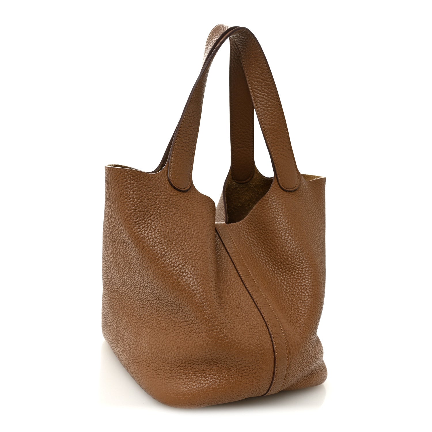 Tan leather tote with wide handles and front lock panel, textured grain