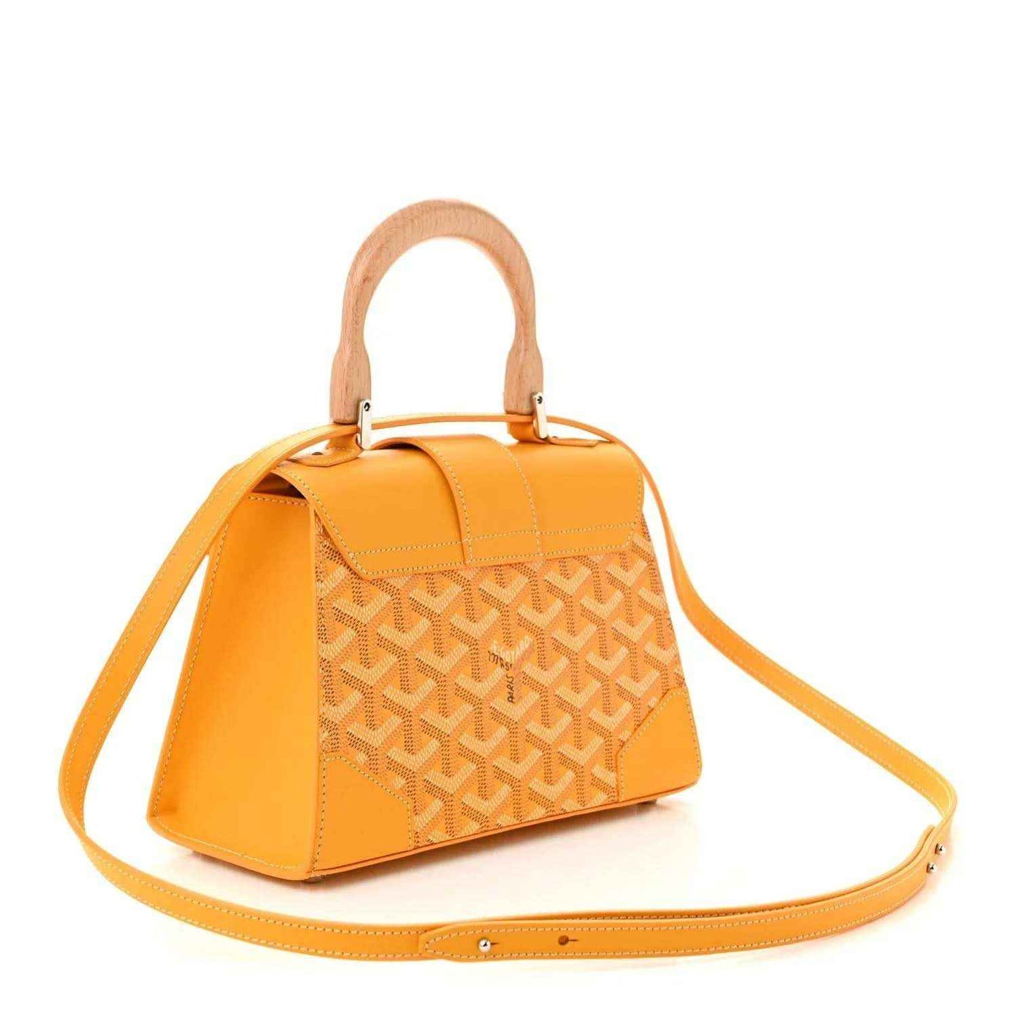 Yellow canvas handbag with short handles, crossbody strap, and Goyardine monogram front.