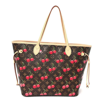 Monogram canvas tote bag with cherry print, tan leather handles and trim.
