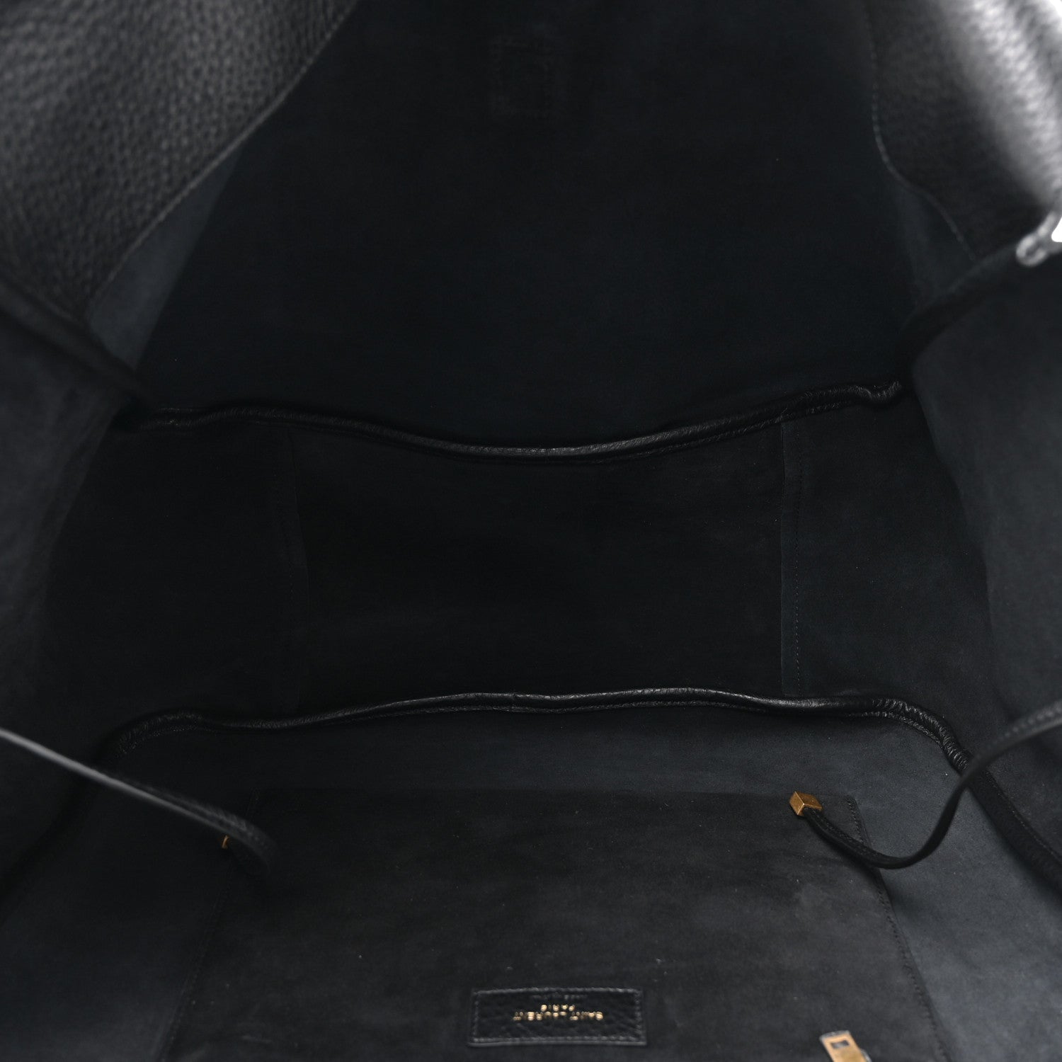 Black leather Bea tote interior with central seam and small logo patch
