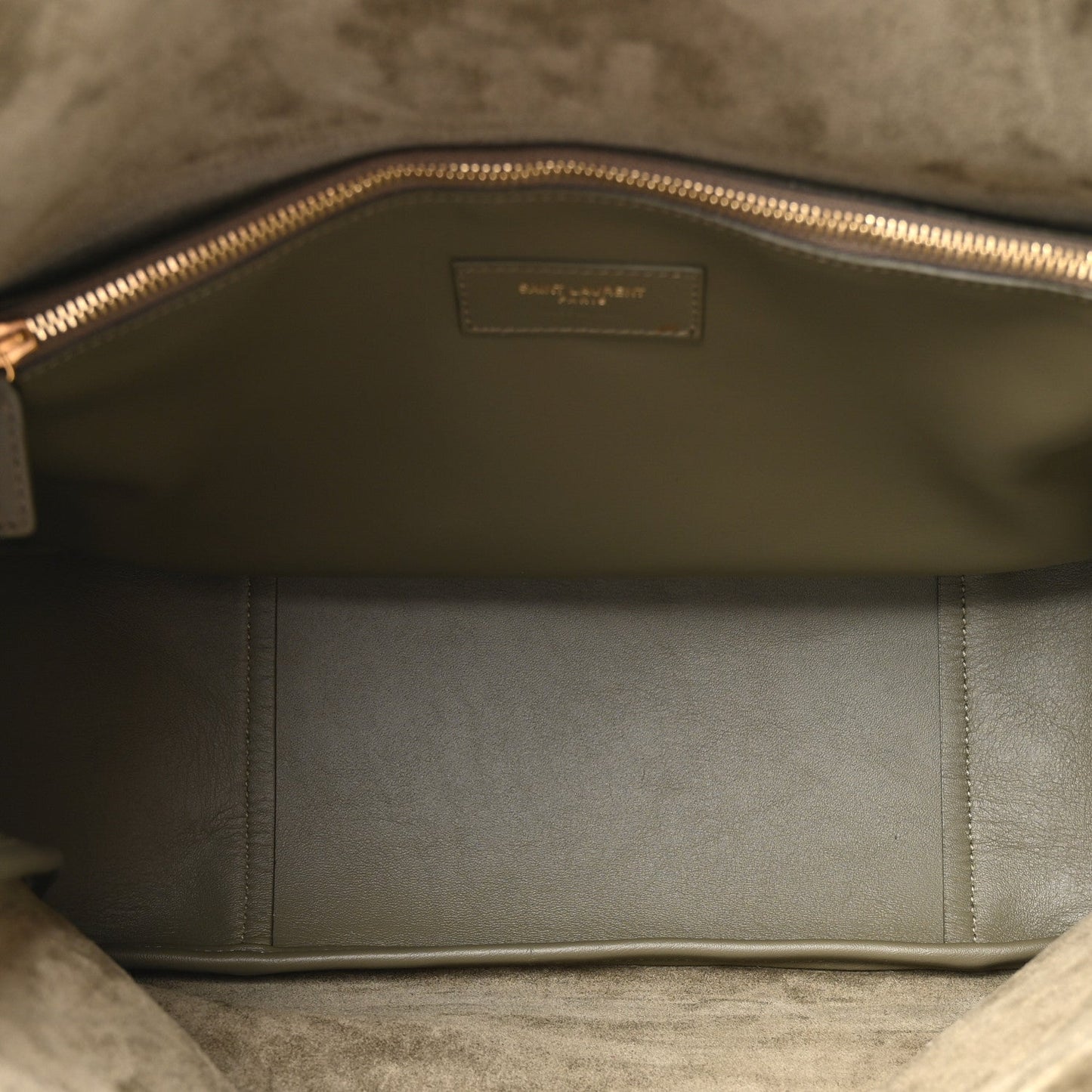 Olive hobo bag interior with fabric lining and gold-tone zipper
