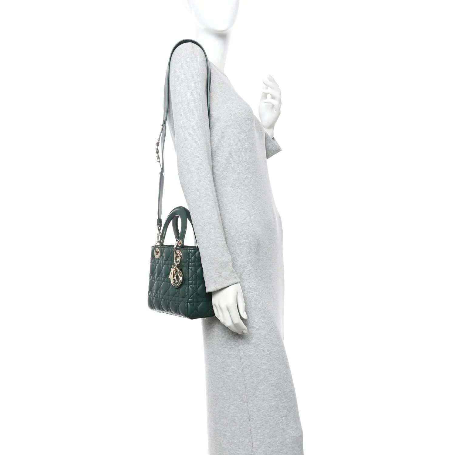 Green quilted lambskin Lady Dior bag with shoulder strap, worn on wrist