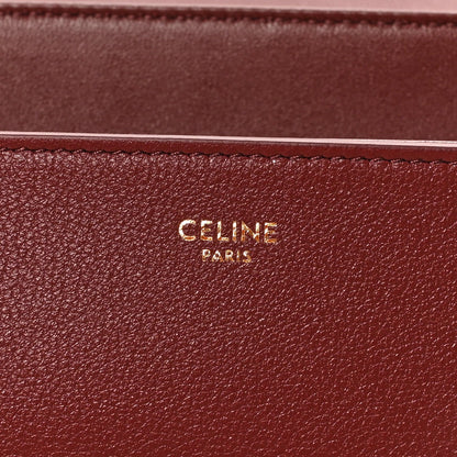 Celine Paris stamped logo on burgundy grained calfskin bag panel