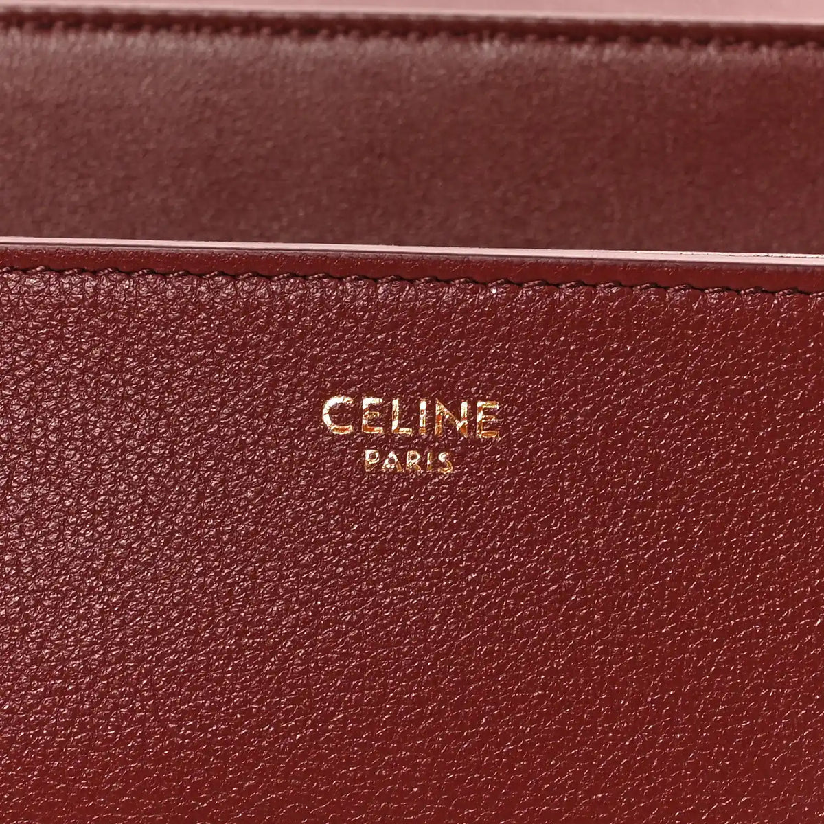 Celine Paris stamped logo on burgundy grained calfskin bag panel