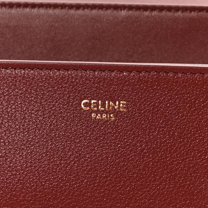 Celine Paris stamped logo on burgundy grained calfskin bag panel
