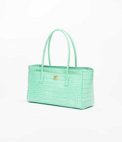 Small teal croc-embossed leather shopping tote with gold Chanel logo and two handles