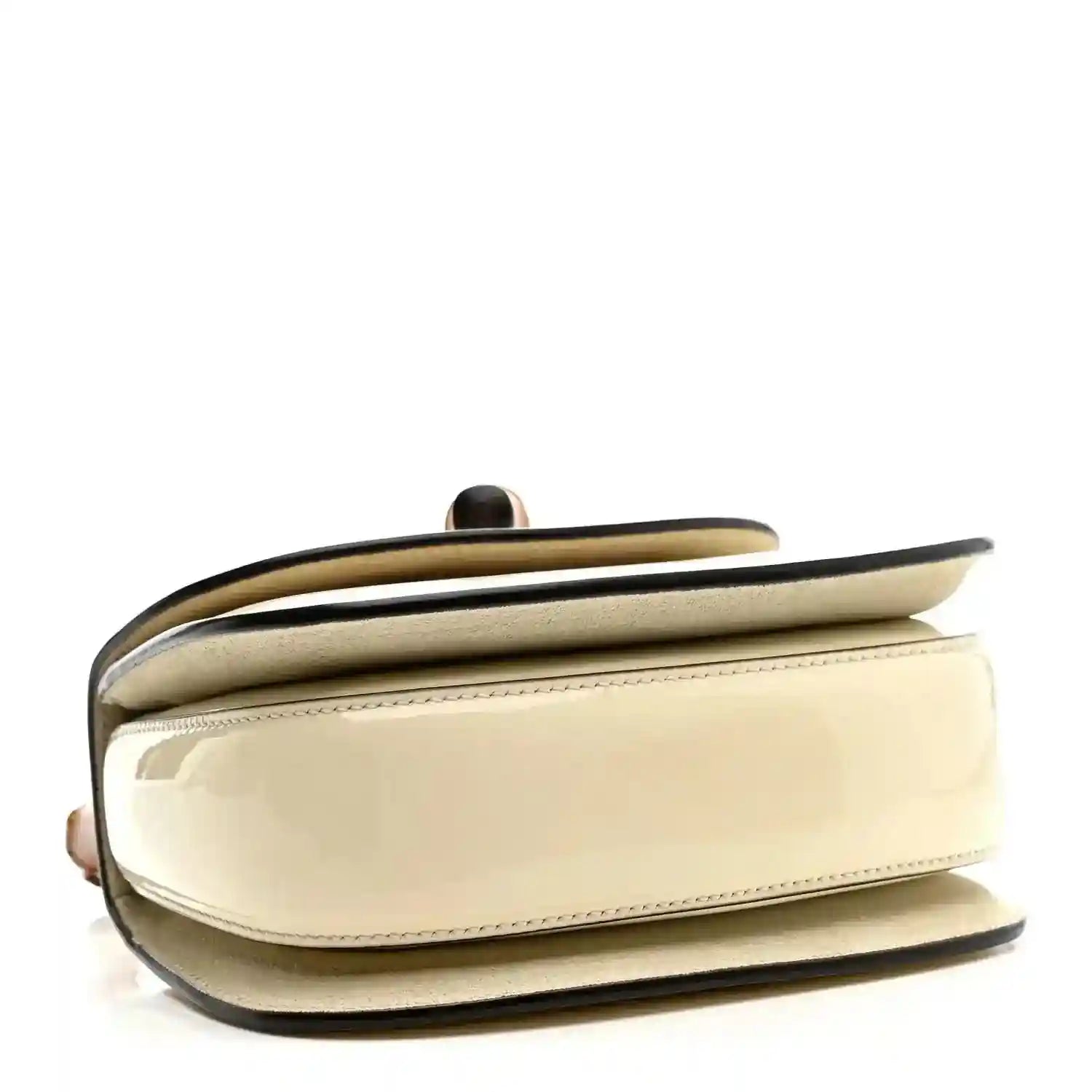 White mini handbag with curved flap and glossy trim edge