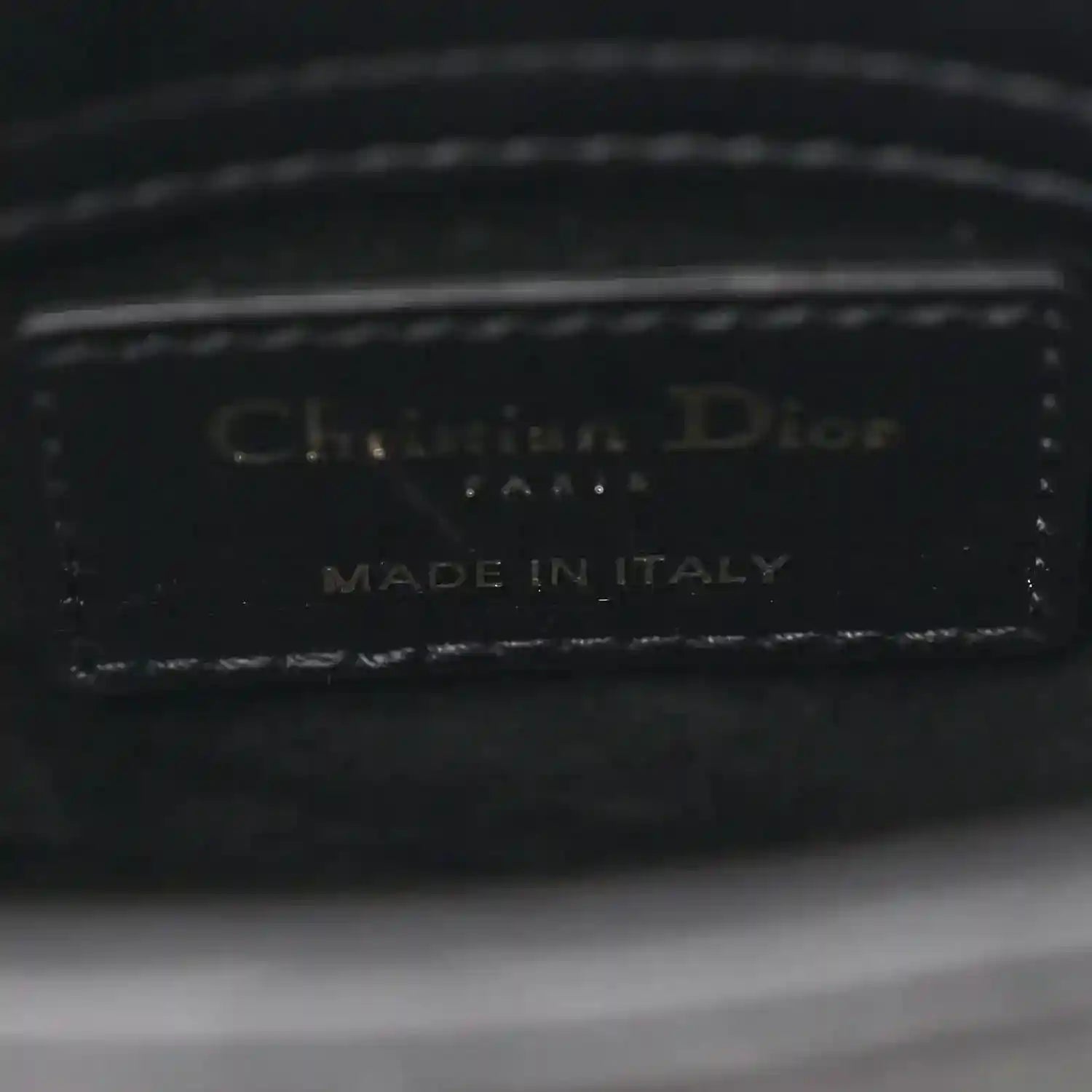 Black leather handbag interior label: Christian Dior, Made in Italy