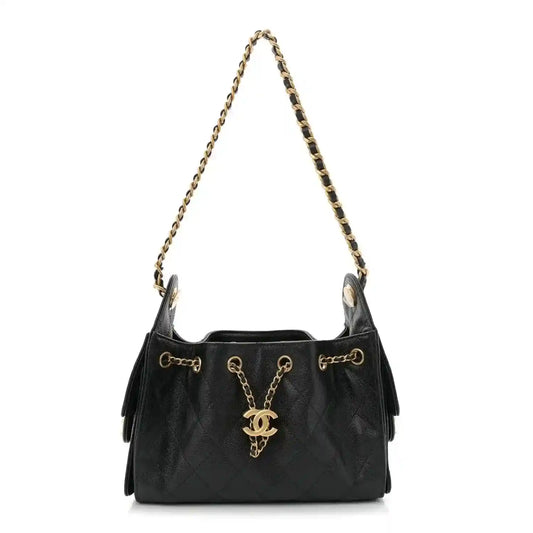 Black quilted mini handbag with chain handles and CC charm, ruthenium hardware