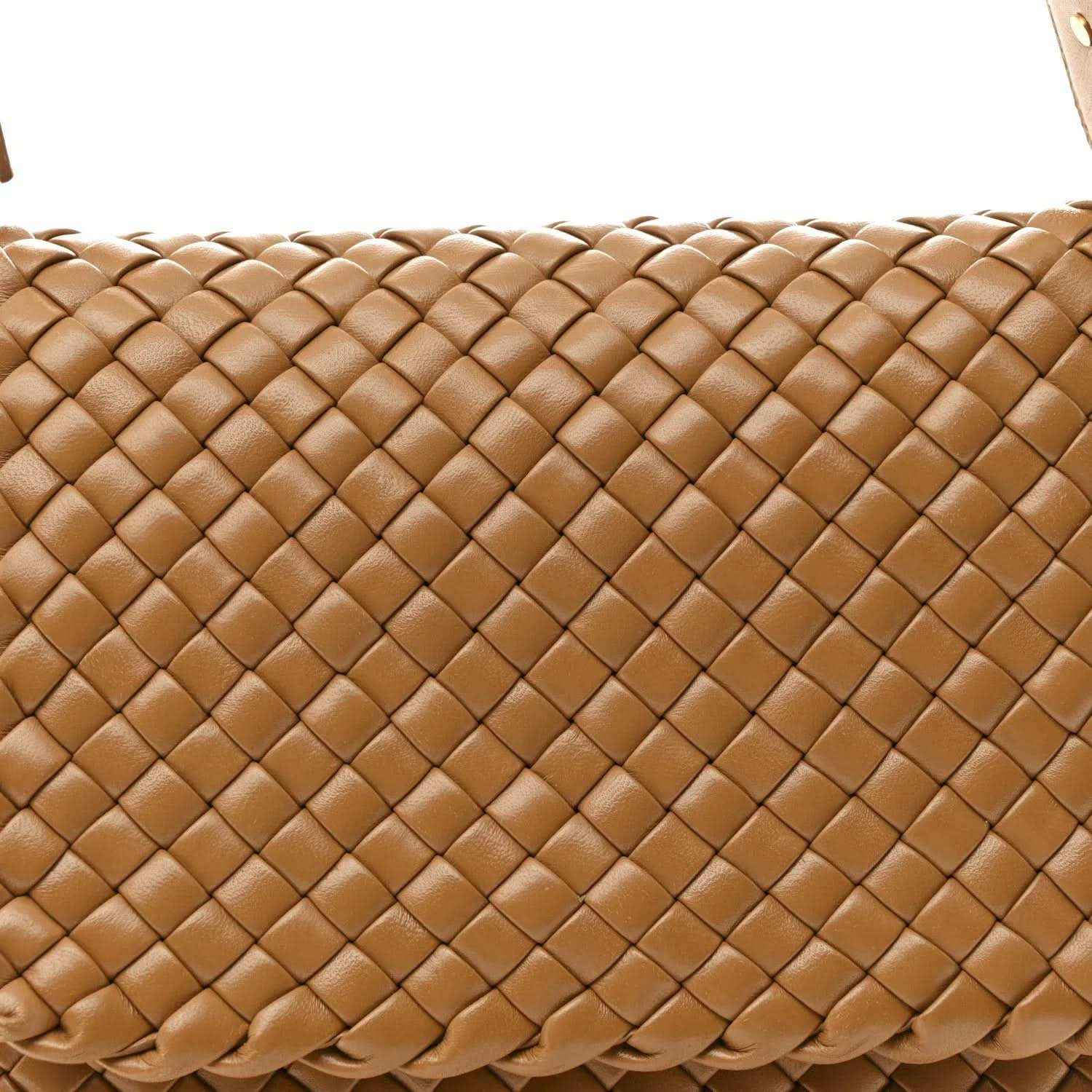 Caramel woven leather bag close-up showing cobble intreccio pattern and raised texture