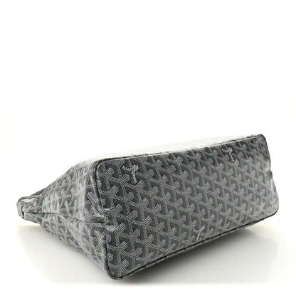 Grey canvas hobo bag with repeating pattern, side profile and zip-top