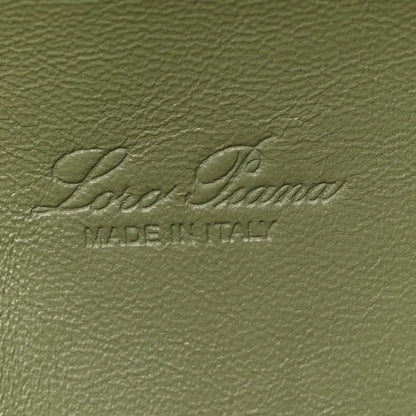 Embossed Loro Piana logo on sage green grained calfskin lining