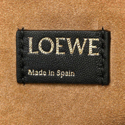 Black leather Loewe tag with LOEWE lettering and Made in Spain