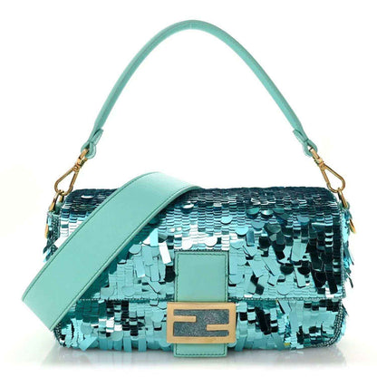 Turquoise sequin baguette bag with gold-tone chain straps and front logo plaque