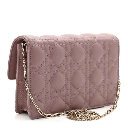Purple quilted leather chain pouch bag, side view with long strap and gold-tone chain