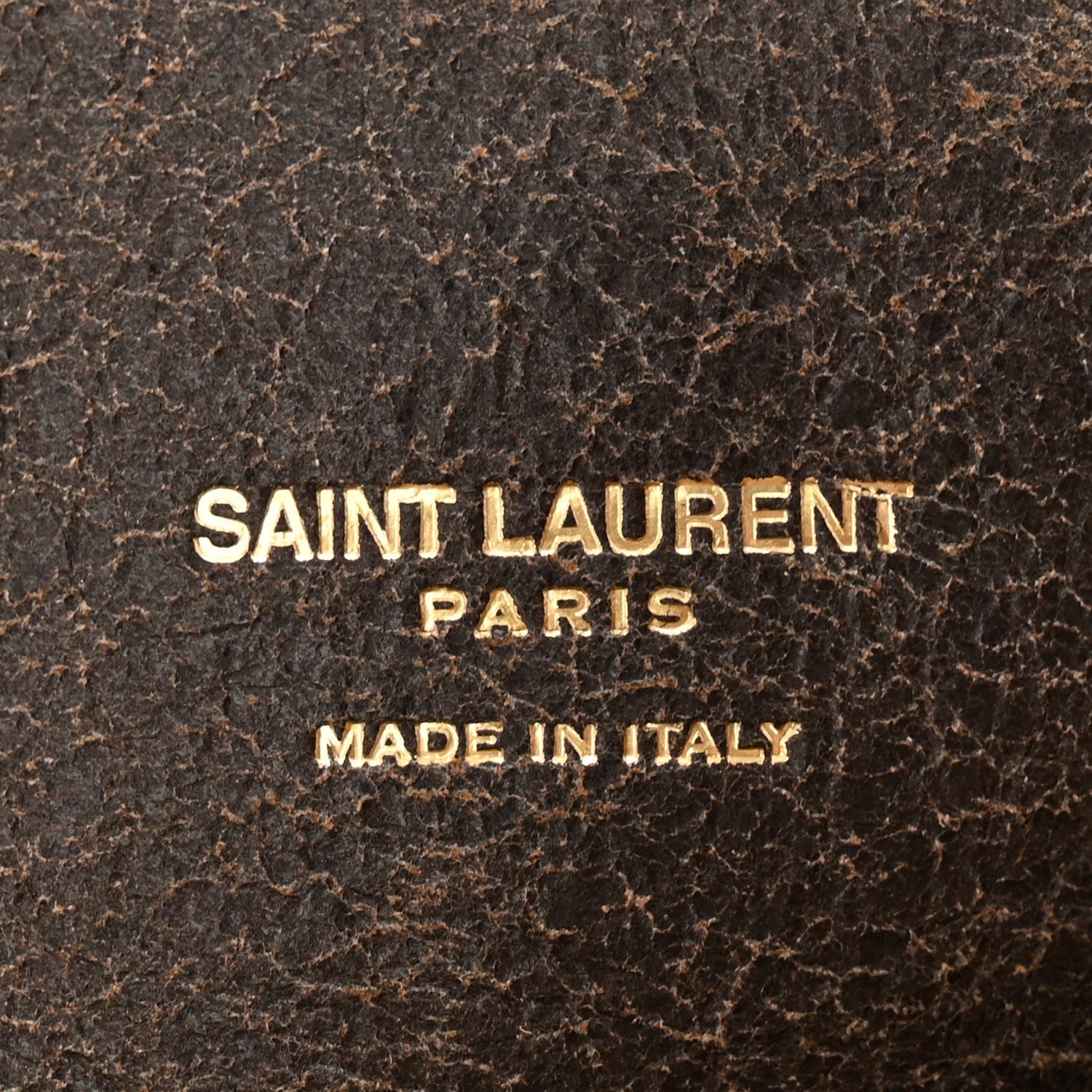 SAINT LAURENT PARIS Made in Italy gold text on dark brown leather