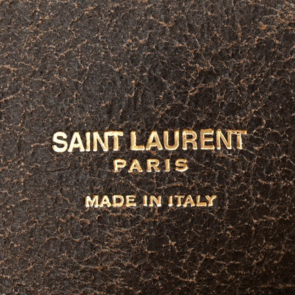 SAINT LAURENT PARIS Made in Italy gold text on dark brown leather