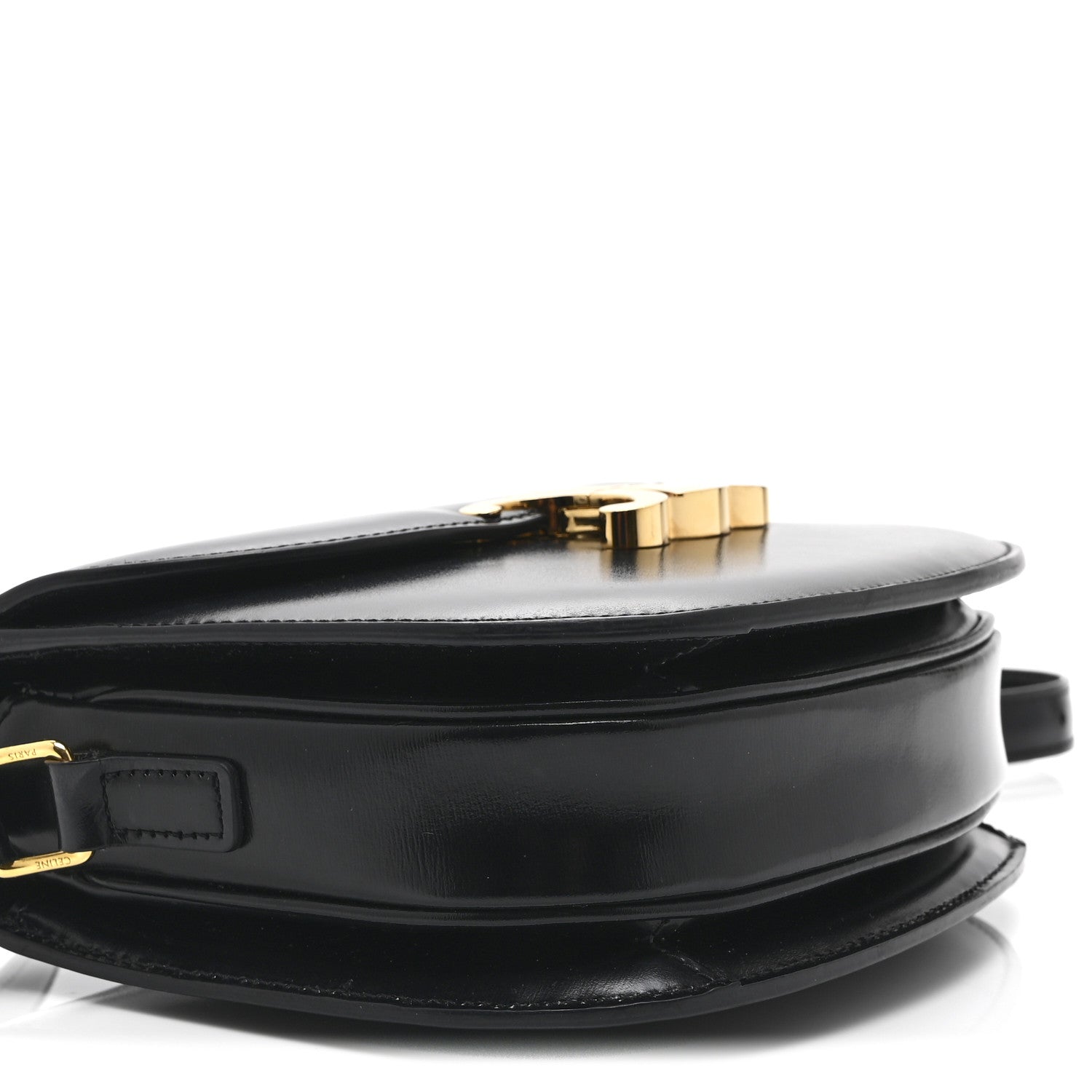 Black leather crossbody bag with gold-tone top clasp and front strap detail