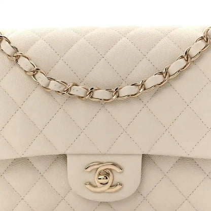 White quilted caviar leather flap bag with chain strap and CC turn-lock